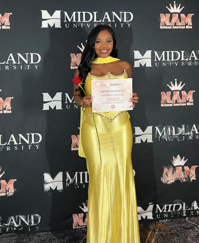 Alexis Mawere full-length at the National American Miss backdrop